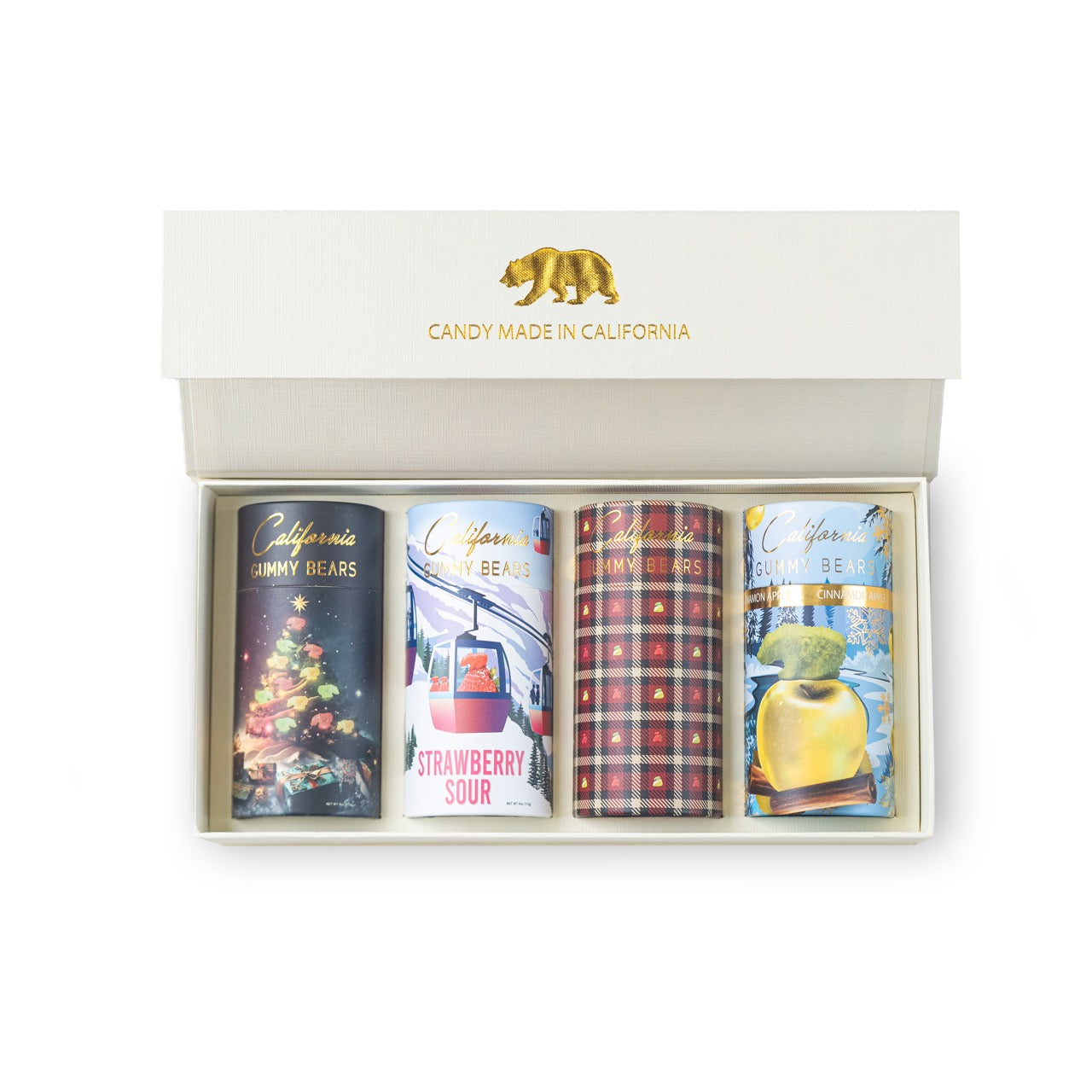 Four candy tins in a box with 'Candy Made in California' branding.